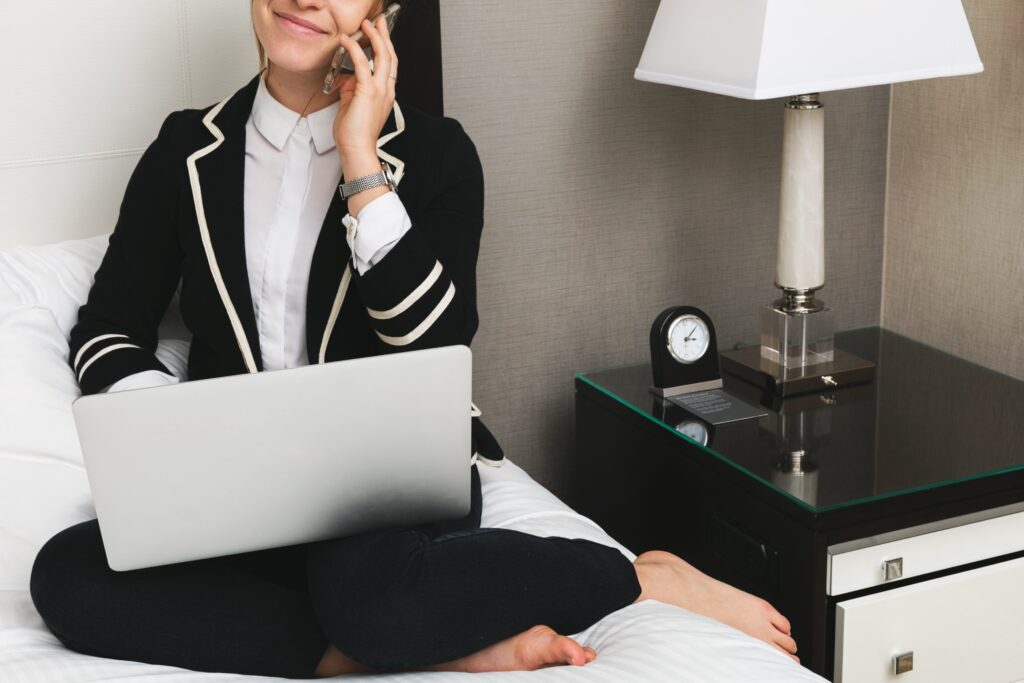 resume writing business woman working on top of a bed